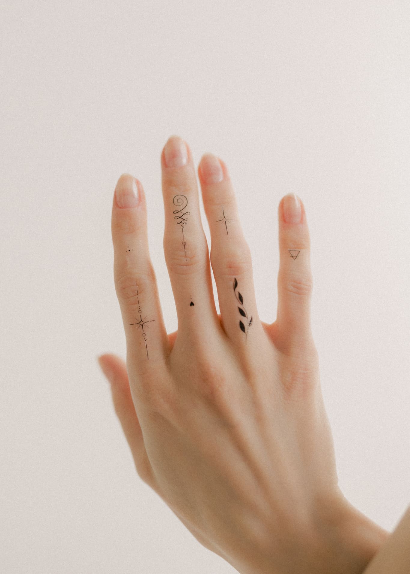 Best Minimalist Hand Tattoo Designs + Ideas To Try
